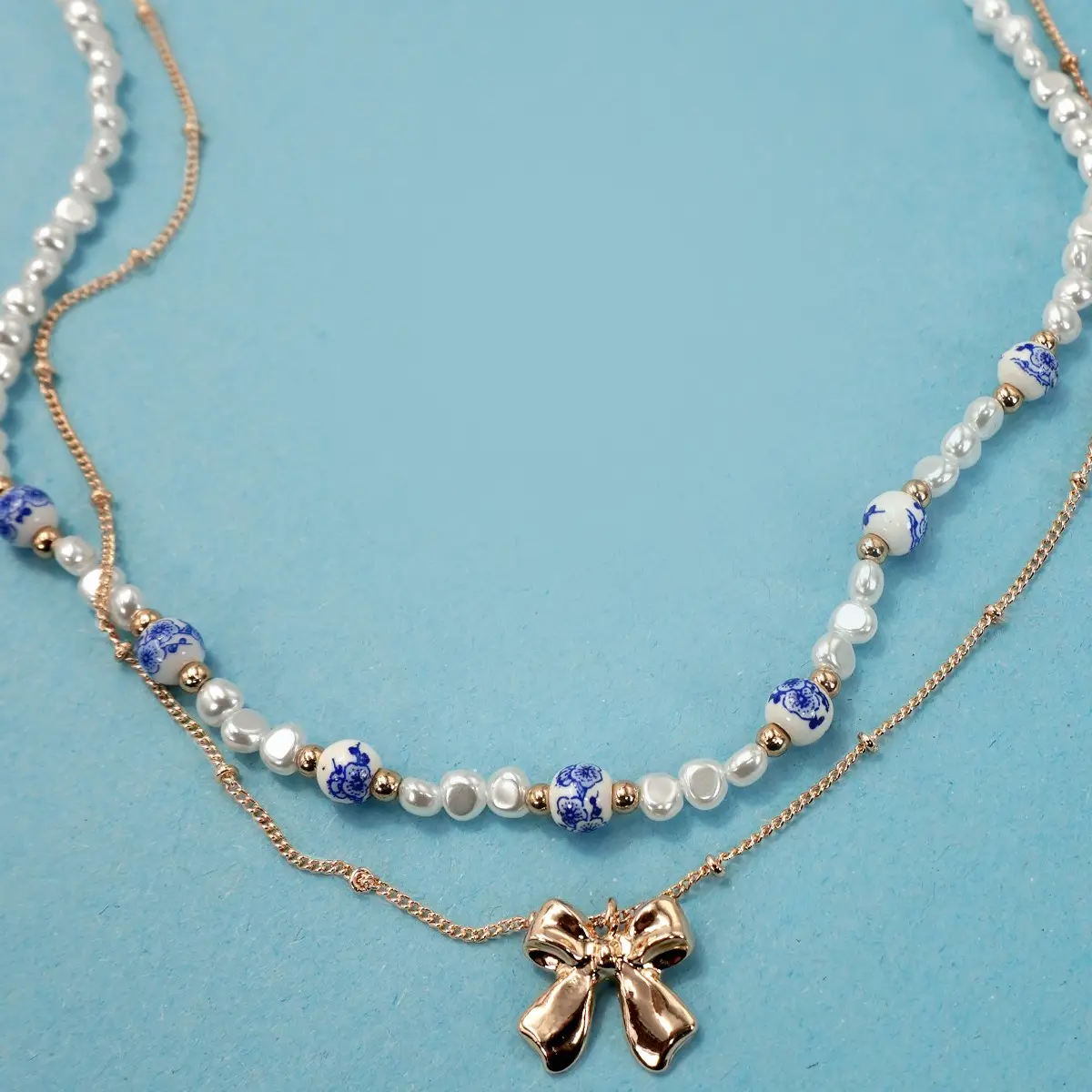 Porcelain Pearl Bow Layered Necklace