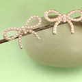 Pearl Bow Stud Earrings